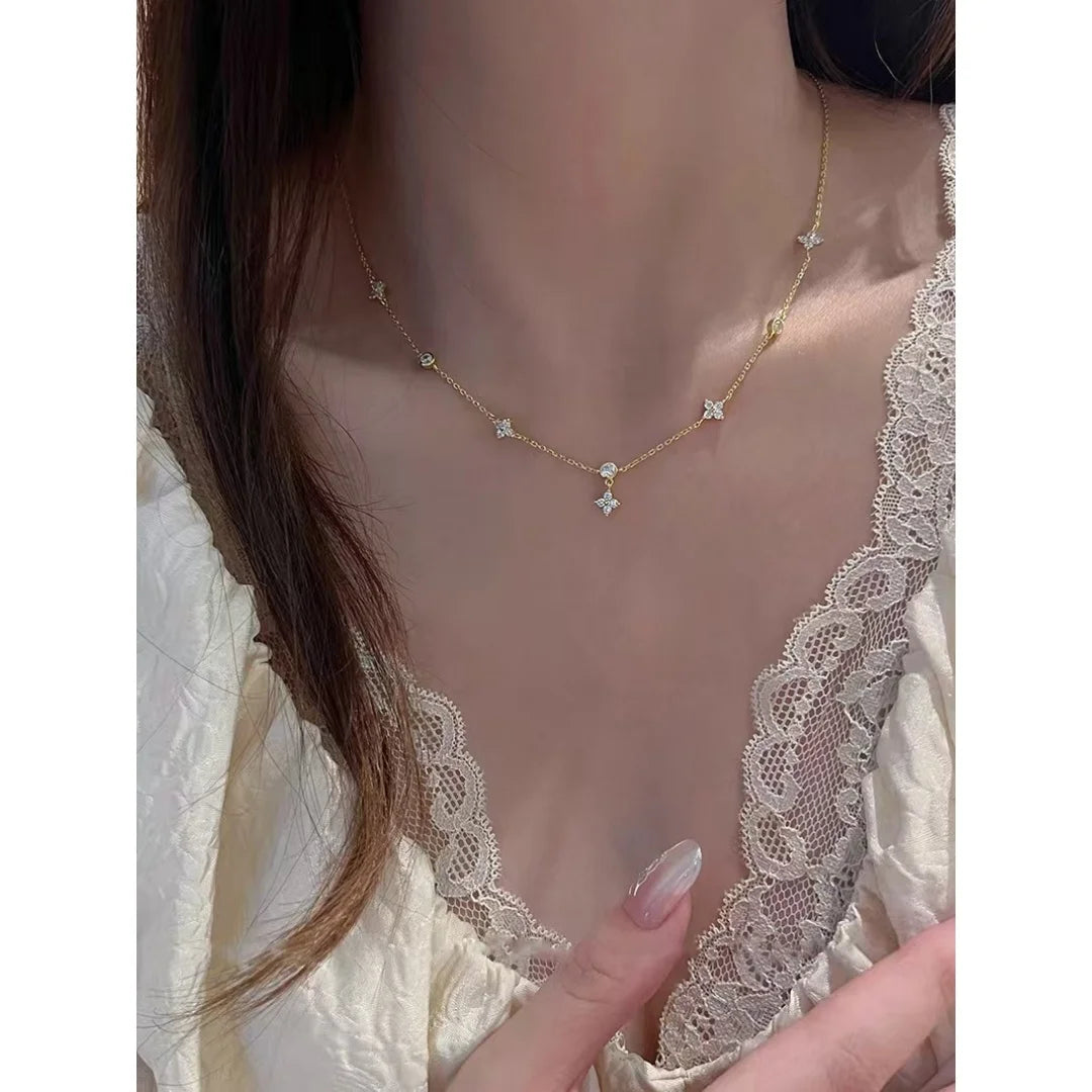 Chic zircon four-leaf clover necklace for women, a minimalist luxury collarbone chain.